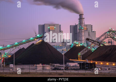 Coal used to play a vital role in electricity generation worldwide. Altough modern plants are much more efficient than before, it is a very polluting  Stock Photo