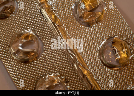 gold coloured blister pack close up Stock Photo