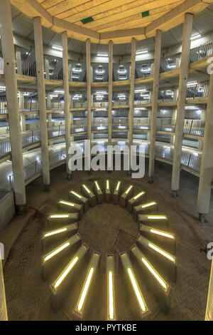 GRONINGEN, NETHERLANDS - APRIL 12, 2016: Colorful lights in Central Column of Ossenmarkt underground parking garage. Stock Photo