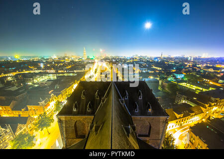 Aerial view over Groningen city by night under full moon Stock Photo