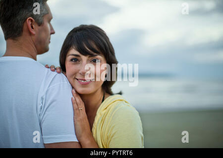 Married couple enjoy romantic day at beach. Stock Photo