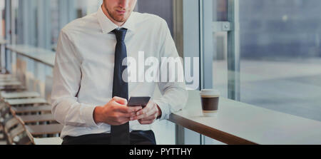 technology, unrecognizable business man using smartphone, mobile app for banking online or reading emails Stock Photo