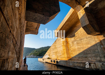 Abandoned submarine pen in Parja cove on the island of Vis, Croatia. Stock Photo