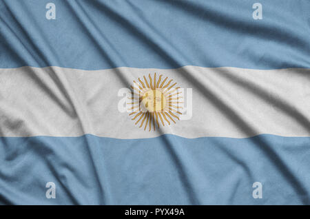 Argentina flag  is depicted on a sports cloth fabric with many folds. Sport team waving banner Stock Photo