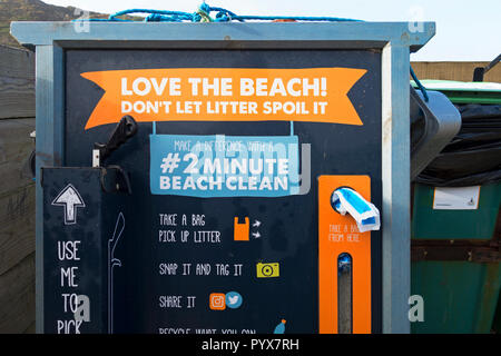 2 minute beach cleaning station, for public volunteers to use to keep plastics and other litter off the beachn at porthtowan, cornwall, england, uk. Stock Photo