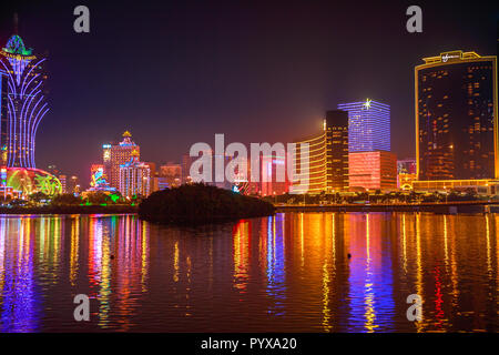 Macau, China - December 9, 2016: Cityscape of famous Casino mirroring in Nam Van Lake, a man-made lake in southern end of Macao Peninsula. The city has surpassed Las Vegas in terms of Casinos revenues Stock Photo