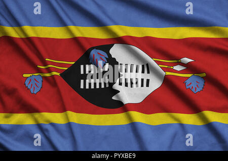Swaziland flag  is depicted on a sports cloth fabric with many folds. Sport team waving banner Stock Photo