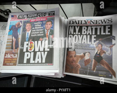 Headlines of the New York Post and New York Daily News on Wednesday, October 24, 2018 report on the previous day's debate between incumbent Democratic Gov. Andrew Cuomo and his Republican opponent Marc Molinaro.  (Â© Richard B. Levine) Stock Photo