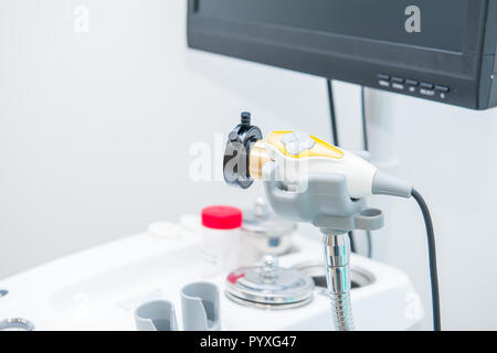 Close up part of Professional EVO ENT Medical Devices Workstation. Ear Nose and Throat Medical equipment. Washing syringe. Selective focus Stock Photo