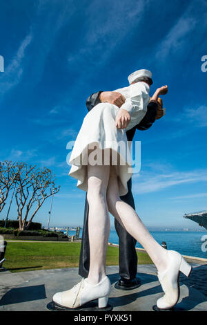 Unconditional Surrender sculpture by Seward Johnson at the USS Midway (aircraft carrier) Museum, San Diego Harbor, San Diego, California. Stock Photo