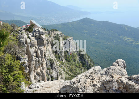 Yellow Car On Aerial Cableway of Ai-Petri Mountain Stock Photo