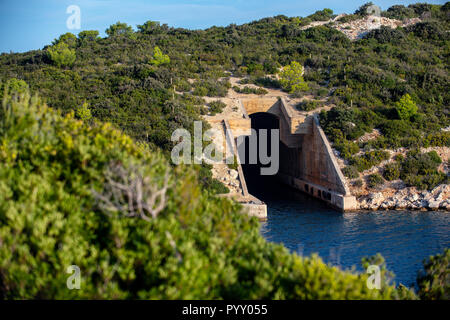 Abandoned submarine pen in Parja cove on the island of Vis, Croatia. Stock Photo