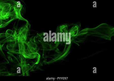 Green smoke abstract on black background Stock Photo