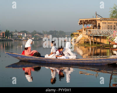 Shikaras are the traditional way to travel on Dal Lake Stock Photo