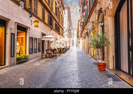 Famous Italian street Via Borgogna with shops and restaurants, Rome, no people Stock Photo