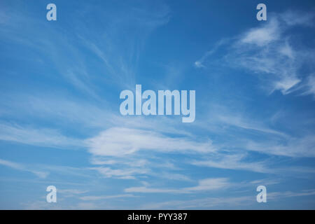 Blue sky with a small amount of thin white clouds Stock Photo