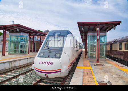 Ronda, Andalucia, Spain-October 20, 2017:  Speed train waiting for passengers on a platform Stock Photo