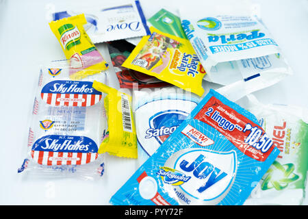 Concept image of plastic pollution highlighting the problem of single use plastic packaging within the Philippines.This type of packaging is in wide u Stock Photo