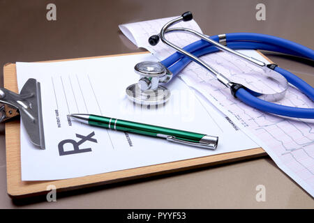 RX prescription, Red heart, asorted pils and a stethoscope on white background Stock Photo