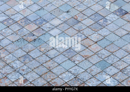 Old stone roof tiles in ordered diagonal pattern, for textured background Stock Photo