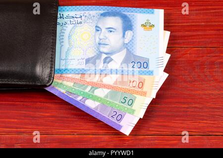 Moroccan money in the black wallet Stock Photo
