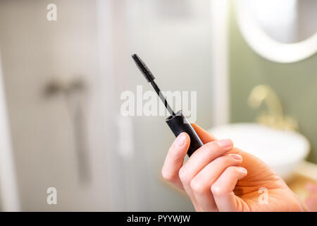 Close-up view of the eyelash brush on the bathroom background Stock Photo