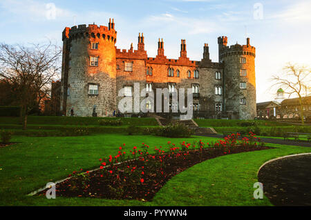 Kilkenny Castle and gardens in the evening. It is one of the most visited tourist sites in Ireland Stock Photo