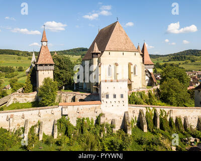 Biertan town and Biertan lutheran evangelical fortified church in Sibiu County, Transylvania, Romania. Aerial view. Biserica fortificată din Biertan,  Stock Photo