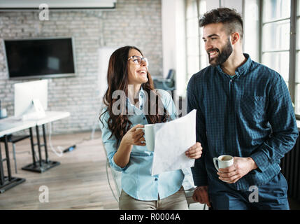 Portrait of architects having discussion in office Stock Photo