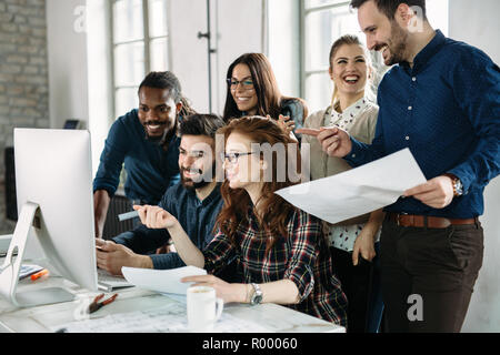 Young architects working on project in office Stock Photo