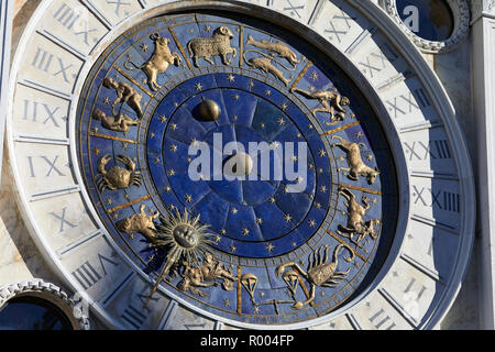 Golden zodiac astrological clock, sunlight and shadow Stock Photo