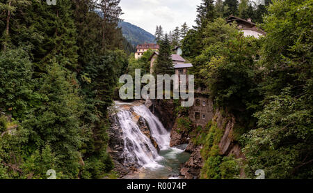 View of the old mill house and waterfall  in the Austrian city Bad Gastein. Stock Photo