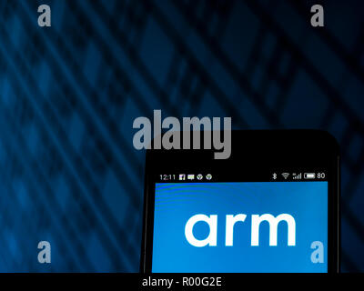 Arm Holdings Semiconductor company  logo seen displayed on smart phone. Arm Holdings is a British multinational semiconductor and software design company, owned by SoftBank Group and its Vision Fund. Stock Photo