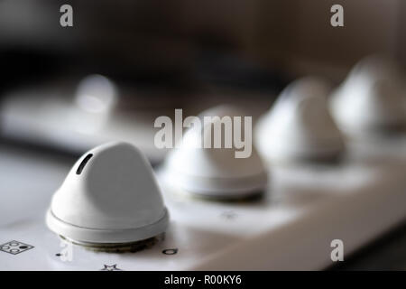 Gas Stove Regulator knobs, white, clean Stock Photo