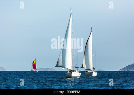 Sailing luxury boats during yacht regatta in the Aegean Sea at Greece. Stock Photo