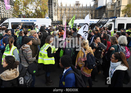Protesters gather in Parliament Square in London as the environmental group Extinction Rebellion launches a mass civil disobedience campaign demanding action on climate change. Stock Photo