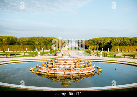 Versailles gardens with Latona fountain and Grand canal during the morning light in Versailles, France Stock Photo