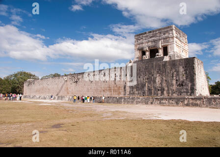 Tourists view the Great Ball Court (Gran Juego de Pelota), used to play a Mesoamerican ballgame, at Chichen Itza, Yucatan, Mexico. Stock Photo