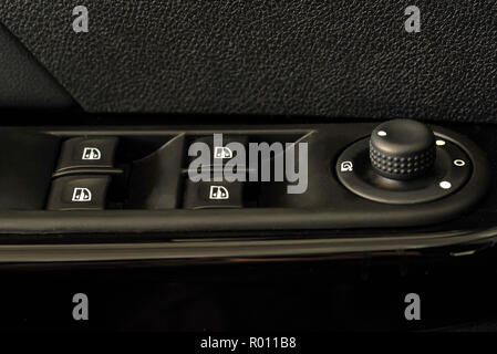 Window and mirror control panel in modern car Stock Photo