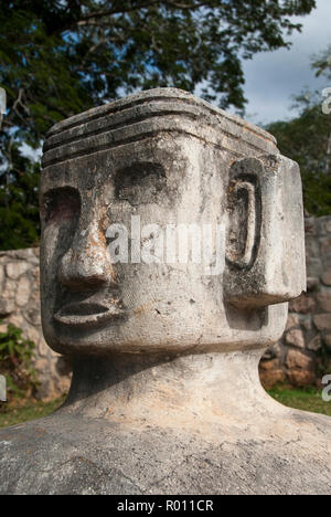 A modern Chacmool, a specific form of Mesoamerican sculpture of a reclining man, possibly symbolizing slain warriors, along the road to Chichen Itza. Stock Photo