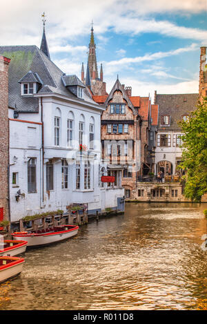 Empty moored canal boats waiting for tourists in Bruges, Belgium.