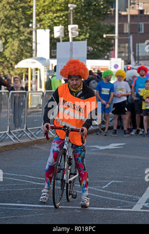 Stereotypical scousers in a curly wigs ready to take part in the Scouse 5k fun run 2018 Stock Photo