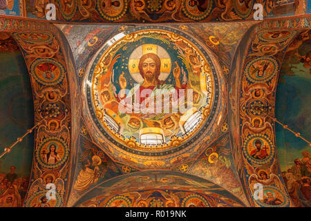 18 September 2018: St Petersburg, Russia - Jesus Christ, interior of the Church of the Saviour on the Spilled Blood, from directly below. Stock Photo