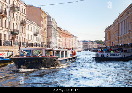 19 September 2018: St Petersburg, Russia - Sightseeing boats on the River Neva, Stock Photo