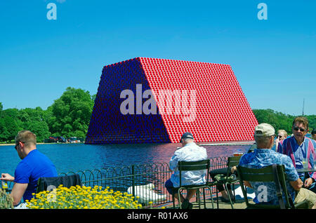 The London Mastaba, an Environmental Art work, 7506 painted oil drums floating on the Serpentine Lake in Hyde park, London. Stock Photo