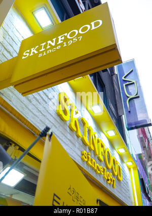 October 2018 - Seoul, South Korea: Yellow logo and storefront of the South Korean skine care and cosmetics brand Skinfood Stock Photo