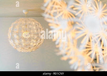 Decorative lamp shade hanging on the ceiling Stock Photo