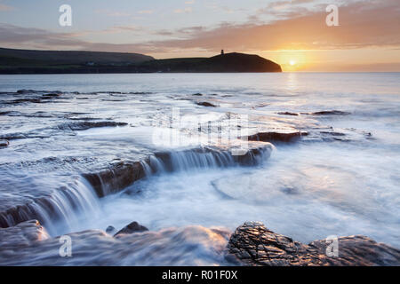 Sunrise over Kimmeridge Bay, Isle of Purbeck, Jurassic Coast, Dorset, England Stock Photo