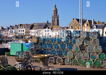 Stack of lobster pot and Notre-Dame-de-Pitié church at Le Croisic, a commune in the Loire-Atlantique department in western France Stock Photo