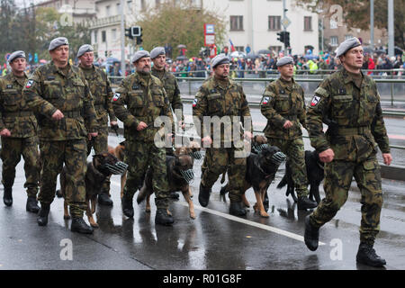 European street, Prague-October 28, 2018: Soldiers with service dogs  are marching on military parade for 100th anniversary of creation Czechoslovakia Stock Photo